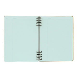 Open notebook with light blue pages on a white background