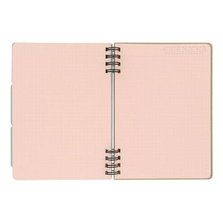 Open notebook with light pink pages on a white background