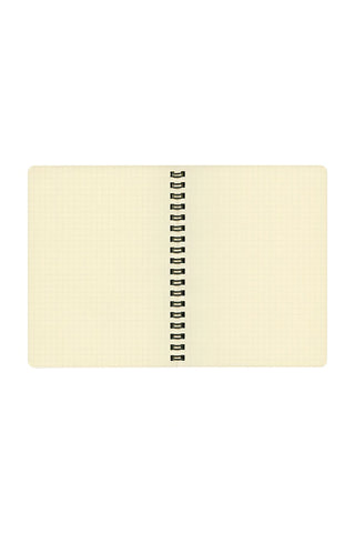 opened spiral notebook with yellow grid pages