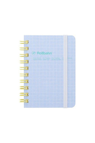 spiral notebook with light blue grid cover, white rubber band and yellow spiral rings that reads 'rollbahn'