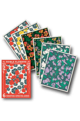 Set of six assorted greeting cards with floral designs on a white background