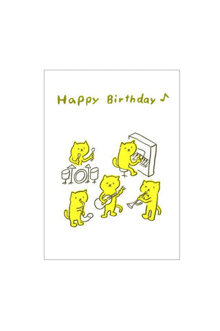 Happy Birthday card with yellow cartoon cats playing instruments on a white background