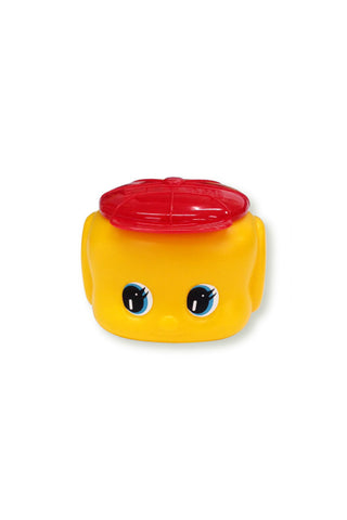 Yellow glue container with a red top on a white background 