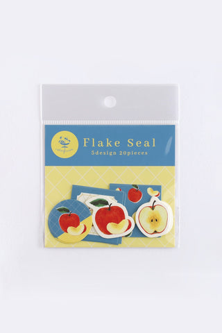 Packaged Flake Seal stickers with apple designs on a white background