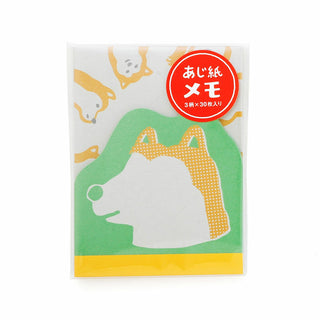 Memo pad with shiba inu design on a white background