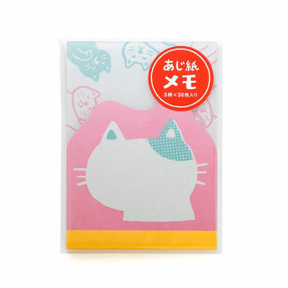 Memo pad with cat design on a white background