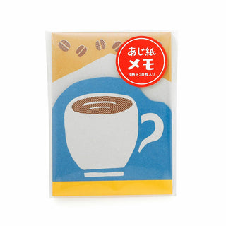 Memo pad with coffee cup design and Japanese text on a white background