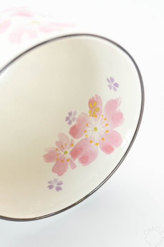 Ceramic mug with floral design on a white background