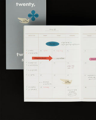 colorful stickers spread throughout planner page