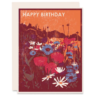 Birthday card with floral design and 'Happy Birthday' text on an orange background