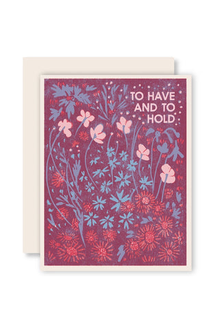 Greeting card with floral design and text "To have and to hold" on a white background