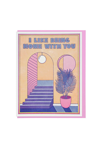Greeting card with text 'I Like Being Home With You' and a stylized door and plant design.