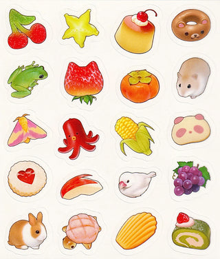 Collection of various food and animal-shaped stickers on a white background
