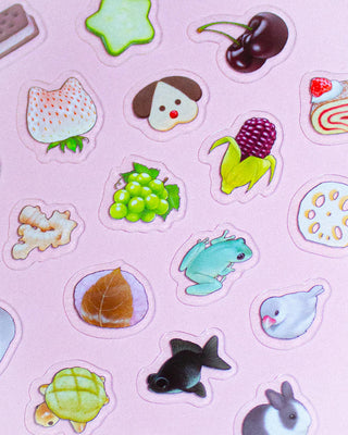 Collection of colorful stickers on a pink background