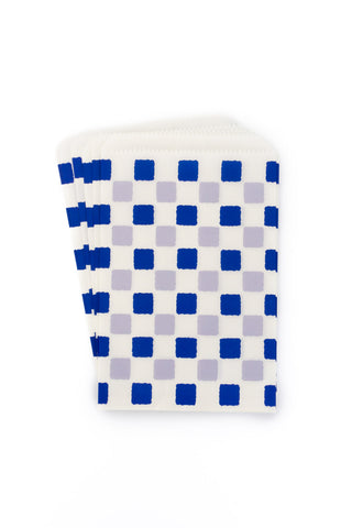 Checkered patterned flat bags on a white background