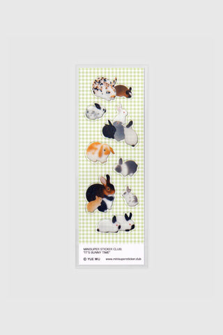 Sticker sheet with small bunny illustrations on a checkered background