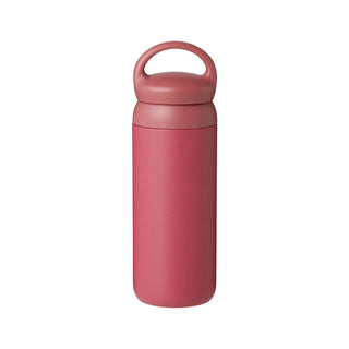 Pink water bottle with a handle on a white background