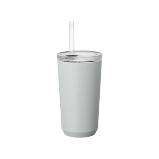 Gray tumbler with a straw on a white background