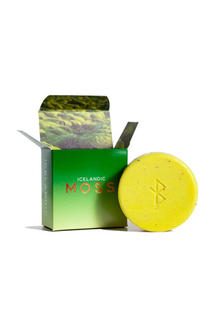 Yellow soap bar with 'Icelandic Moss' packaging on a white background