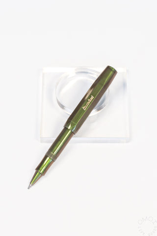 Kaweco lunar shadow green rollerball on a clear stand