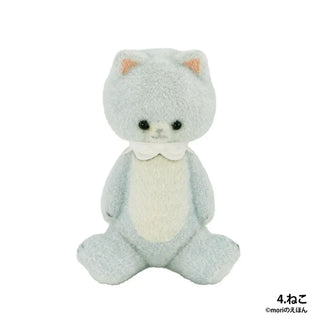 Plush toy resembling a cat with a white belly on a white background