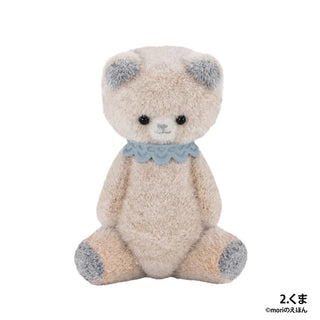 Plush teddy bear with a blue collar on a white background