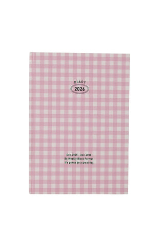 Pink and white checkered planner with '2026' text on a white background. 