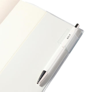Inside pocket of back of planner showing pen loop holder demonstration