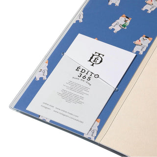 Inside of planner cover showing a slit for card holder. 