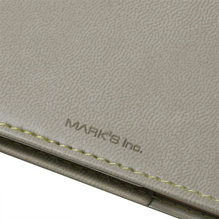 Close-up of back of planner with 'Mark's Inc.' branding.