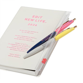 Planner with 'Edit New Life' 2026 text, three pens inside the cover zipper, on a white background