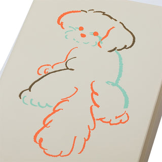 Colorful drawing of a dog on a notebook cover