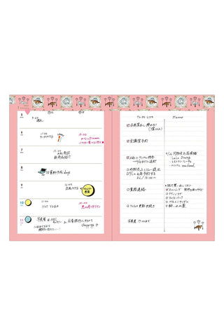 Open pages of weekly planner spread with text and colorful icons on a white background