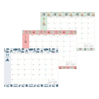 Planner pages with decorative borders and monthly layouts on a white background
