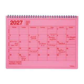 neon pink monthly notebook calendar on a light background