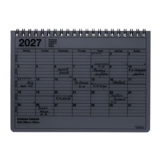 Black 2027 monthly notebook calendar on a white background