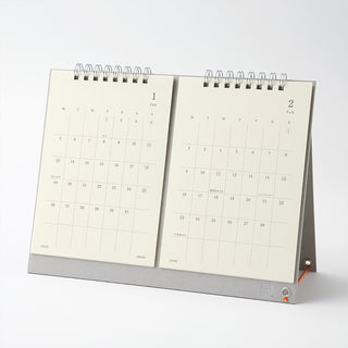 Two-page calendar open to January and February on a white background