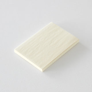 Side angle of MD Notebook monthly planner on a light gray background