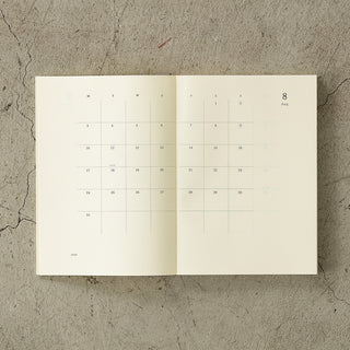 Open calendar to August on a textured surface