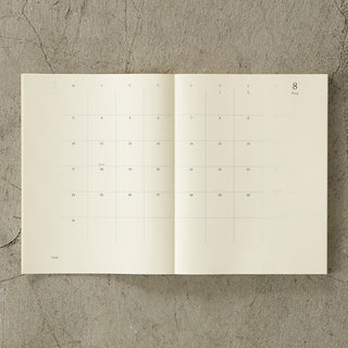Open calendar on a textured surface
