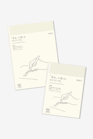 Two white notebooks with black line drawings on a white background