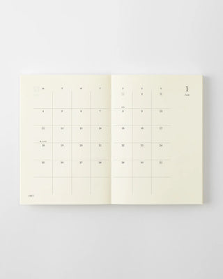 opened notebook calendar with january 2027 spread and minimalist design