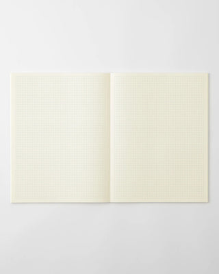 opened notebook planner with grid pages