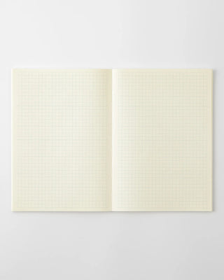 opened notebook planner with grid pages