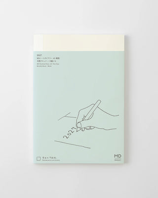 a5 monthly block + memo planner with minimalist blue design
