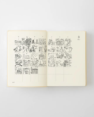 opened notebook calendar with march 2027 spread and handwriting and doodles