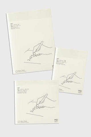 three page a day notebooks with white minimalist design on a light colored background