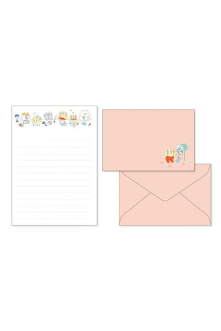 Set of stationery items including a envelopes and lined paper with cartoon character design on a white background