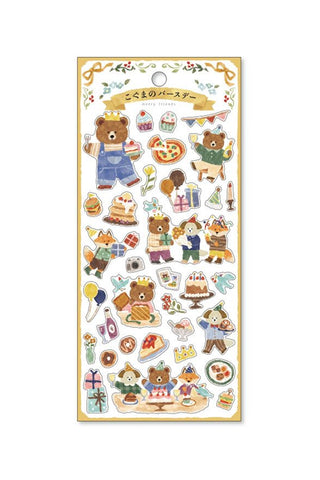 Sheet of decorative stickers featuring cartoon bears and various items on a white background