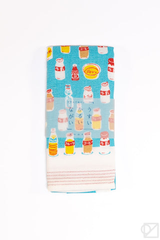 Towel with colorful bottle pattern on a blue background